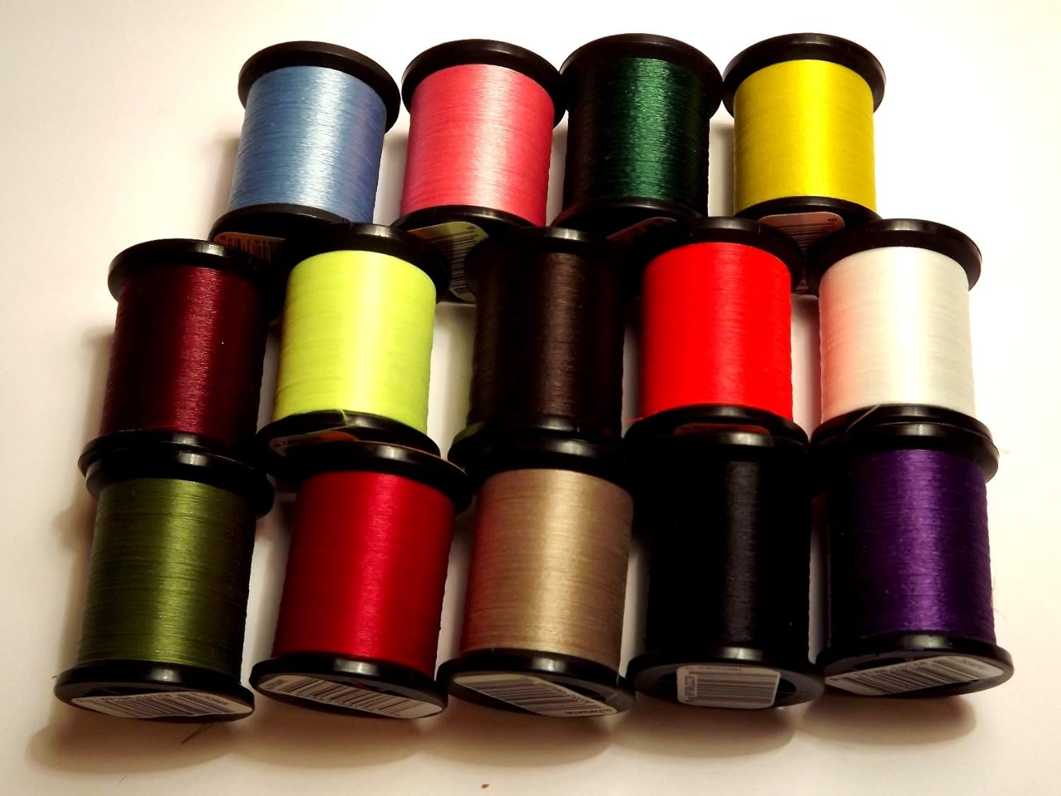 UNI PREWAXED FLY TYING THREAD PACK OF 8 ASSORTED COLOURS FROM FLYMAKER