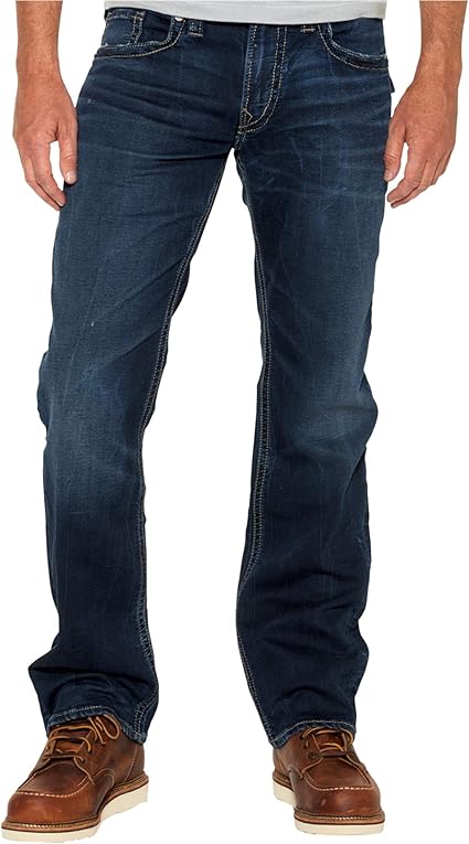 Silver Jeans Co. Men's Zac Relaxed Fit Knit Denim Jeans with Flap Pockets at Amazon Menâs 