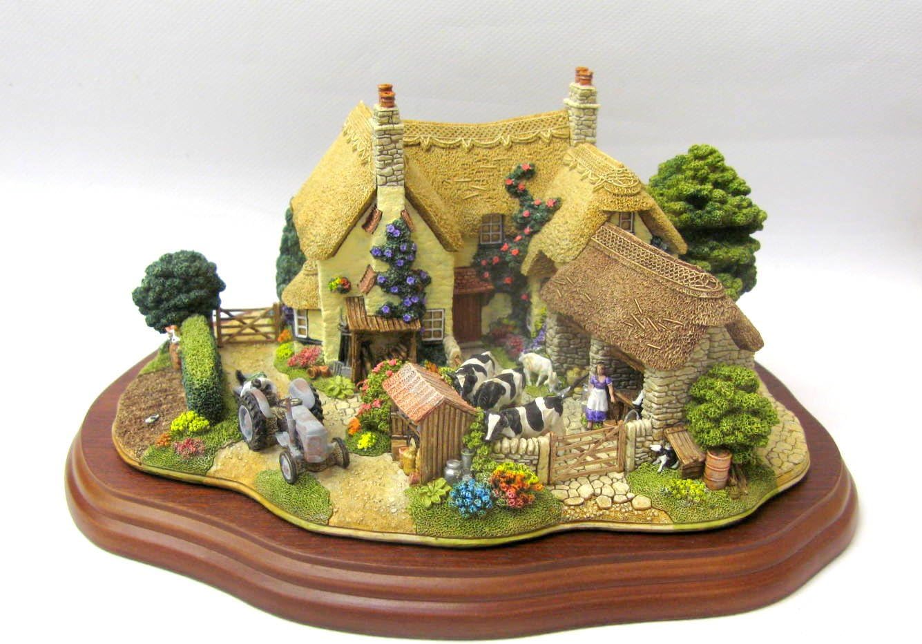 Lilliput Lane We Plough The Fields And Scatter Limited Edition model L2412 Handmade and Hand Painted in England. Please note item is New, box slightly scuffed.