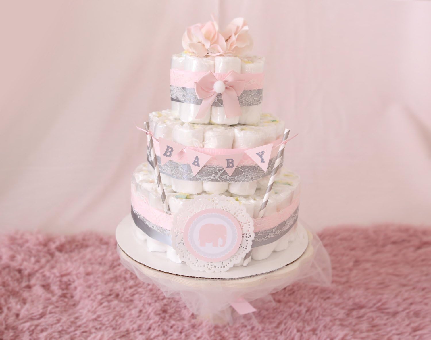 pink and grey elephant diaper cake
