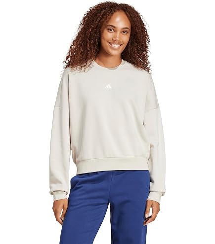 adidas Women's Z.N.E Athletics Hoodie Cold.RDY, Legacy Gold, XS at