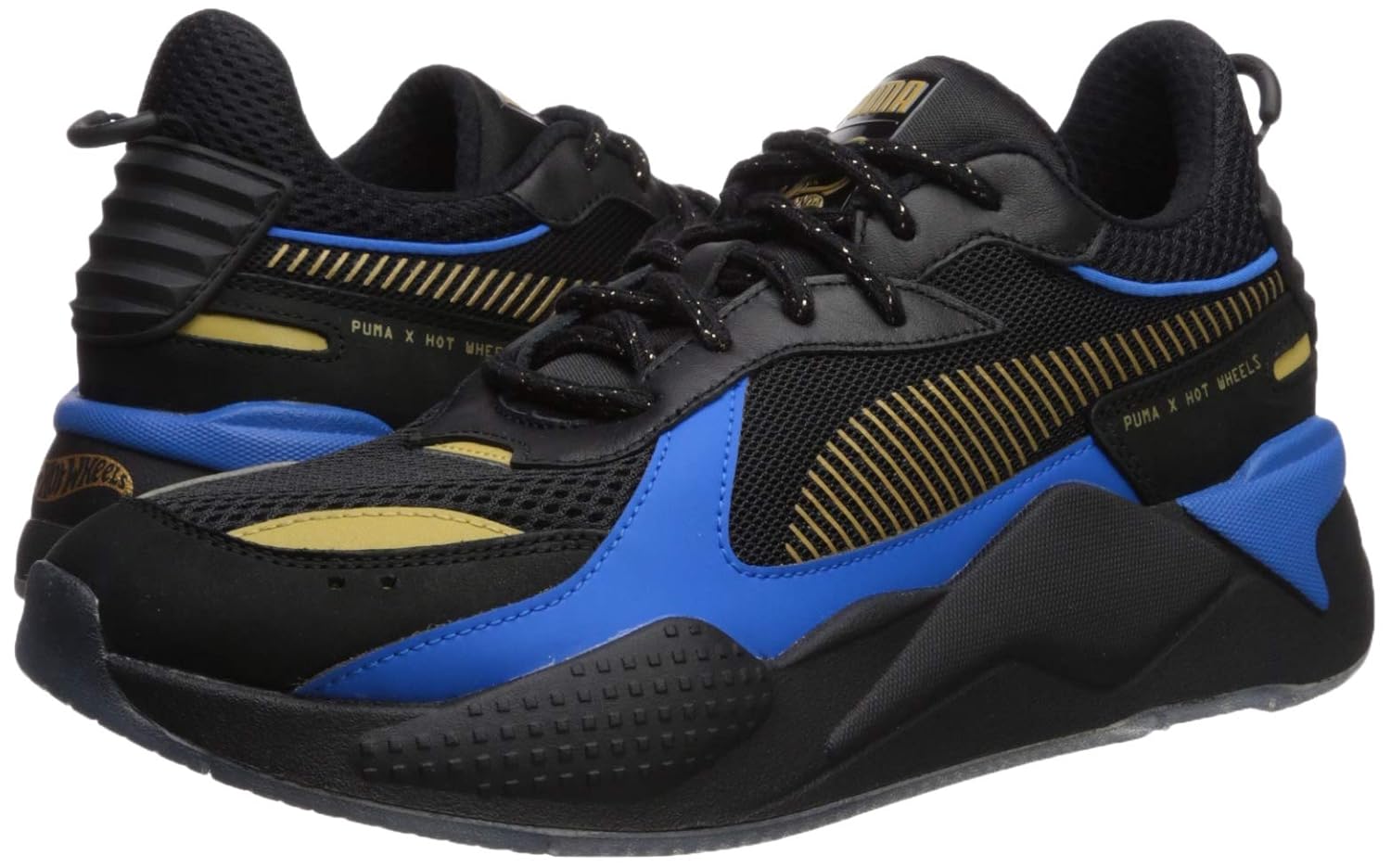 black and gold puma rsx