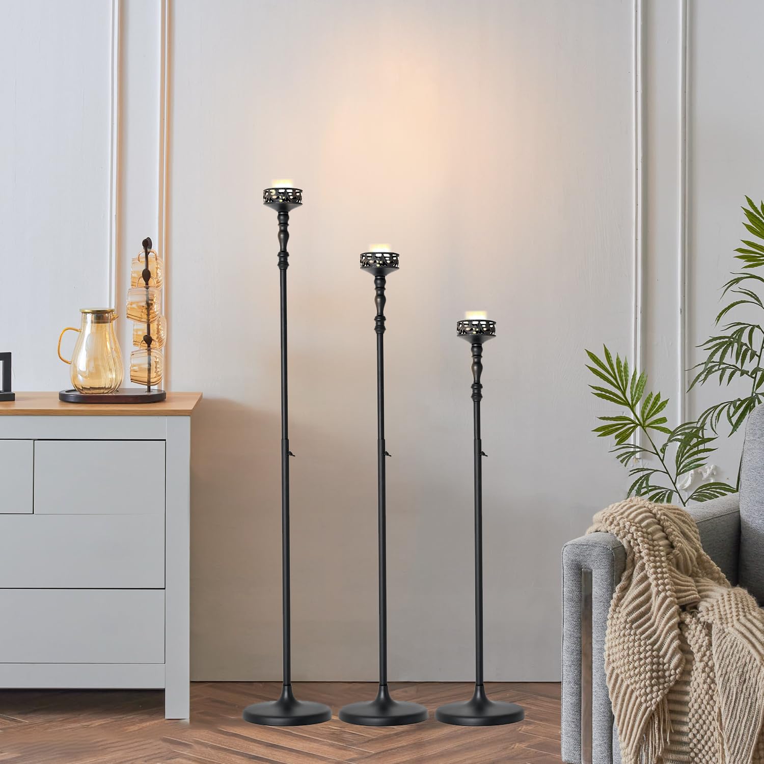Photo 1 of *** BOTTOM PART PEELING OFF *** Floor Candle Holder Centerpieces for Tables,3Pcs Black Candle Holder for Pillar Candles Matte Metal Candlestick Set for Wedding Party Home Candles Holder for Ceremony Mantel Decor (Adjustable Height