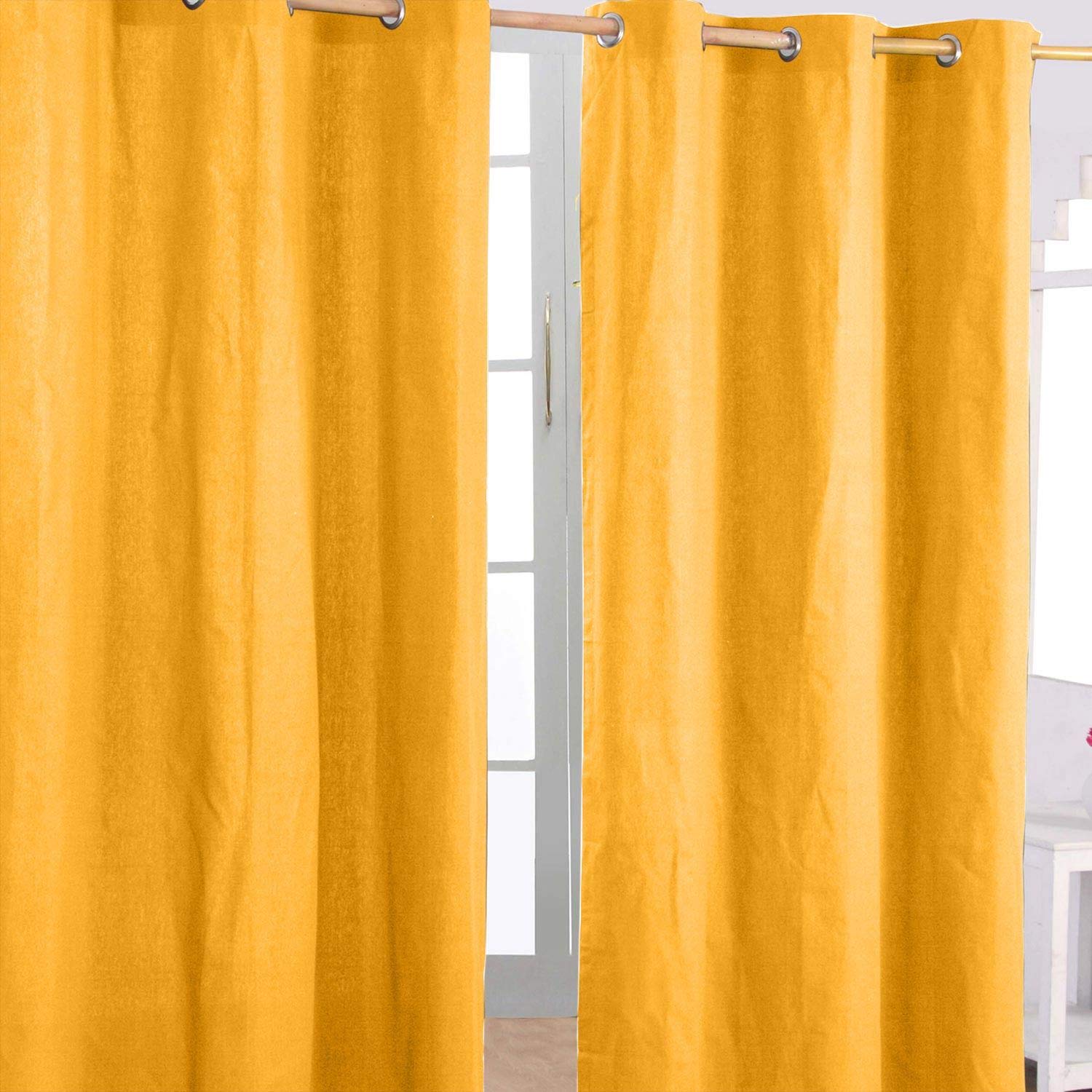 Homescapes Mustard Yellow Eyelet Curtain Pair 117cm (46") Wide x 137cm