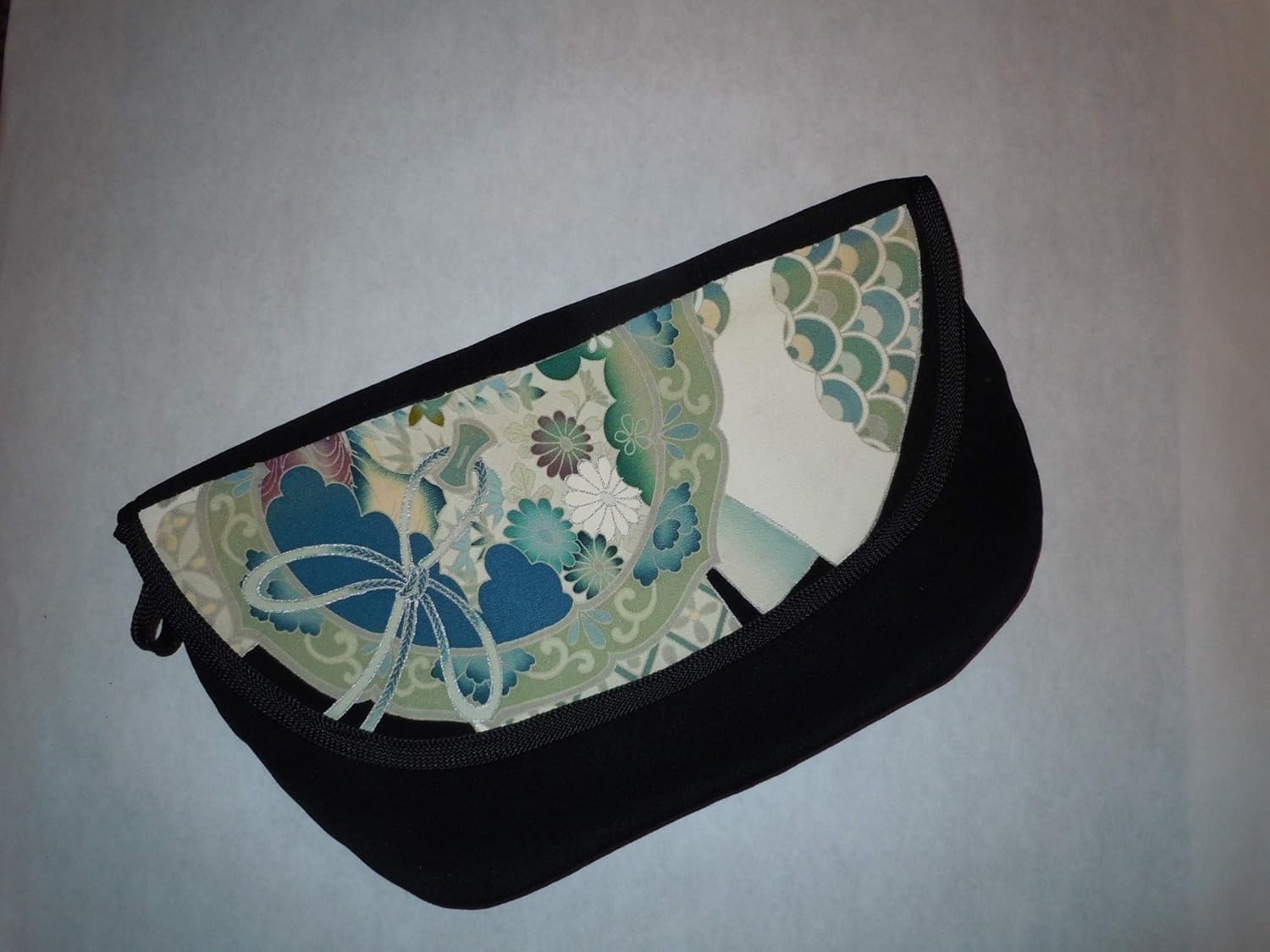 blue and white clutch bag