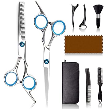 cutting hair with scissors and comb