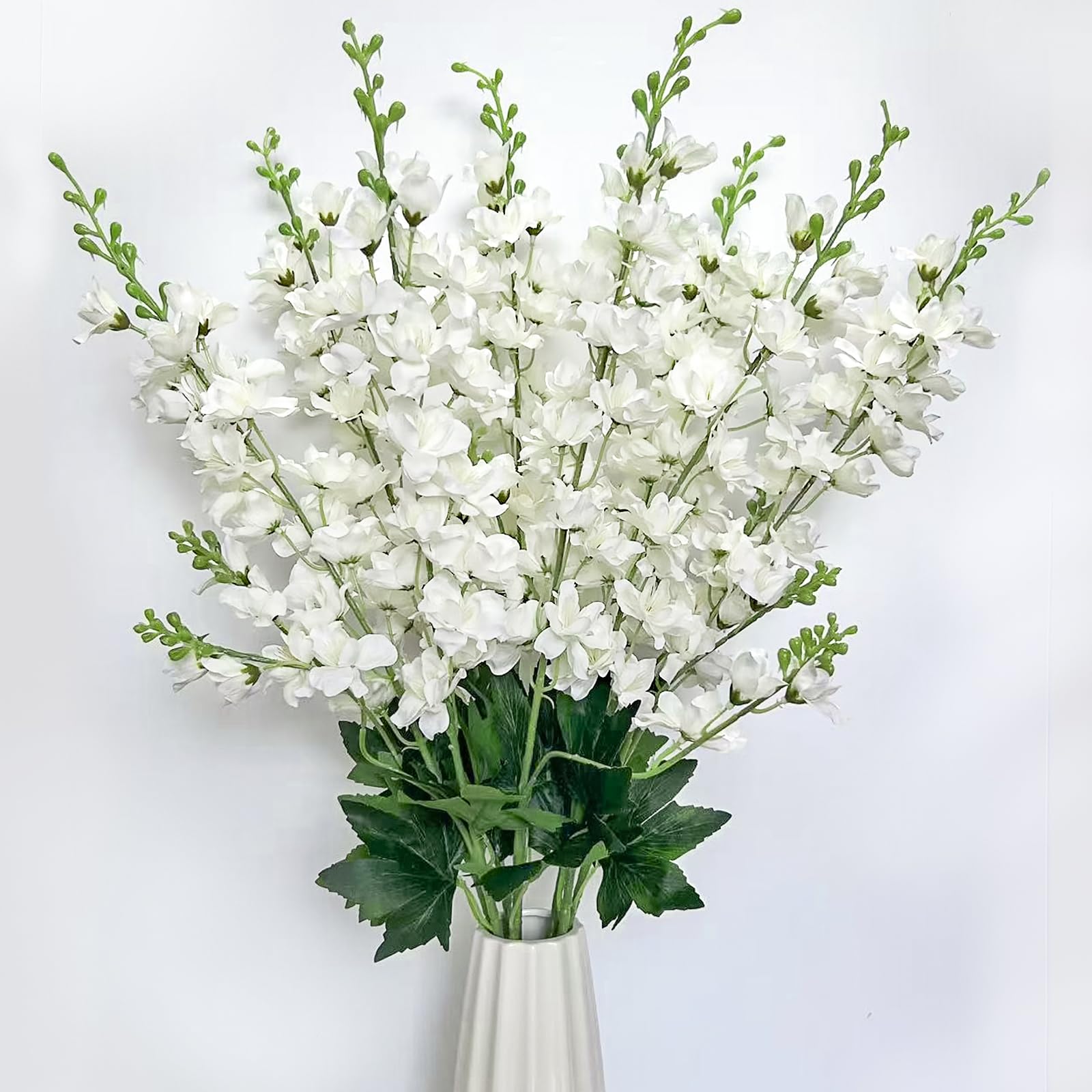 Photo 1 of aunosit 8 pcs White Delphinium Artificial Flowers, 34.25''Artificial Snapdragon Flowers Tall Fake Flowers Silk Flowers Faux Delphinium Bulk for Tall Vase Home Wedding Garden Table Decor (White)