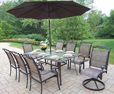 Amazon Com Oakland Living Cascade 9 Piece Dining Set With 72 By 42 Inch Table 6 Stackable Chairs 2 Swivel Rockers 9 Feet Brown Tilting Umbrella And Stand Garden Outdoor