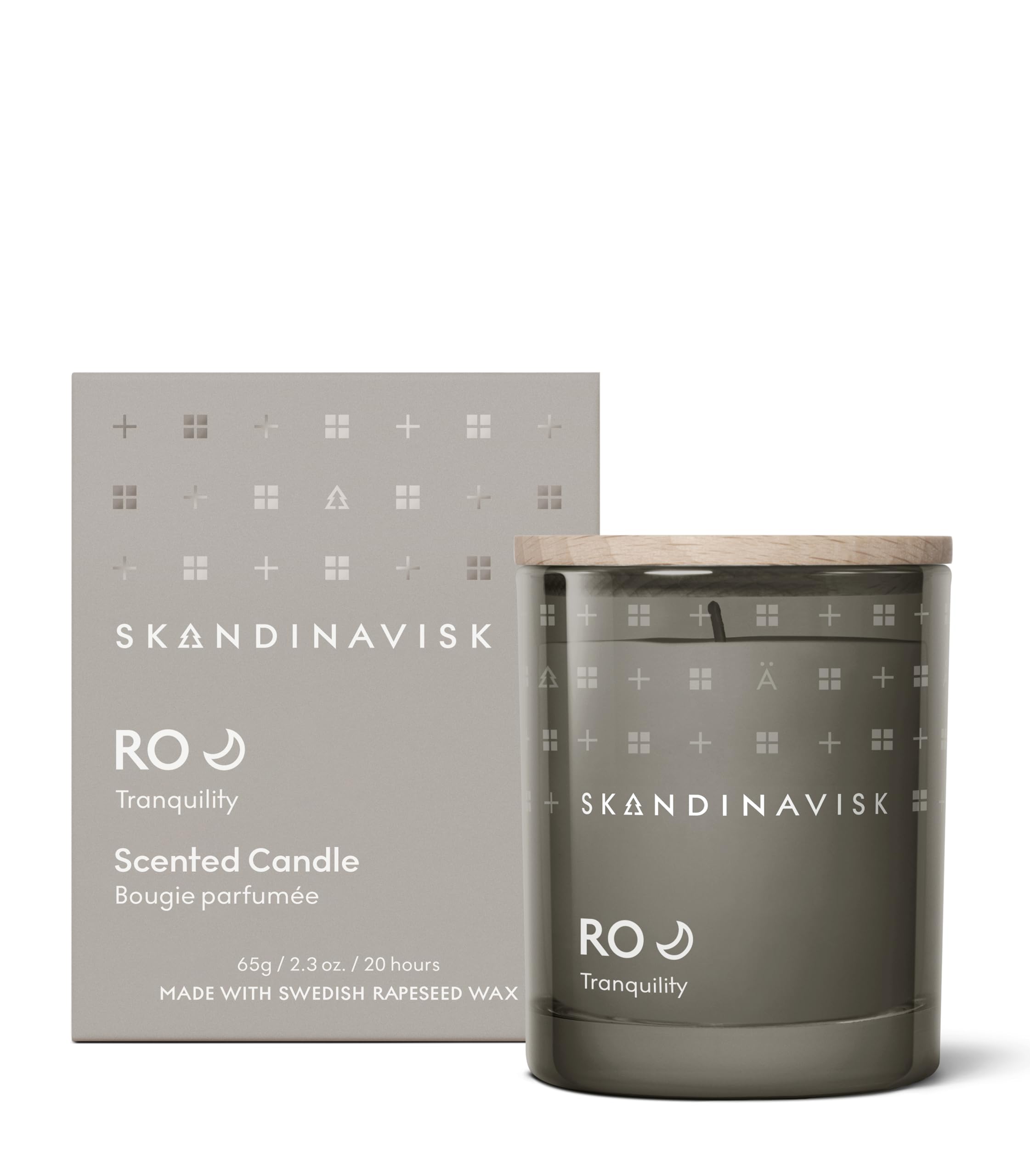 Skandinavisk RO 'Tranquility' Mini Scented Candle. Fragrance Notes: Cut Grass and Fallen Leaves, Cucumber and Wild Violets. 65 g.
