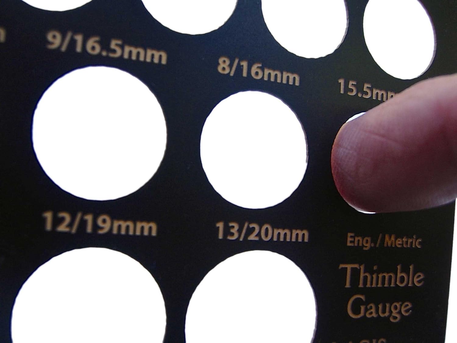 finds sewing finger size Thimble Gauge