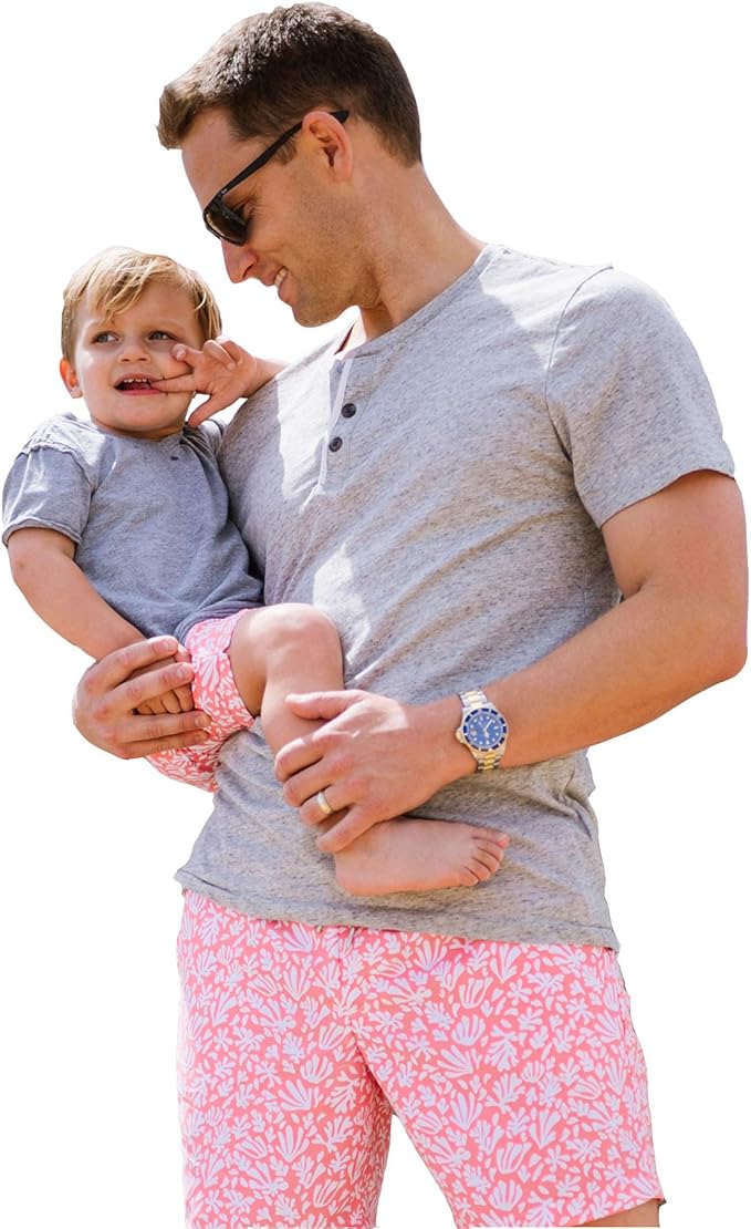 father and baby matching swim trunks