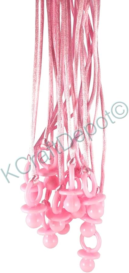 pink plastic pacifiers for baby shower