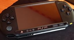 Console Sony PSP Street E1004 - Pack De 2 Jeux (Gran Turismo & Assassin's Creed) - Neuve Sous Scellés