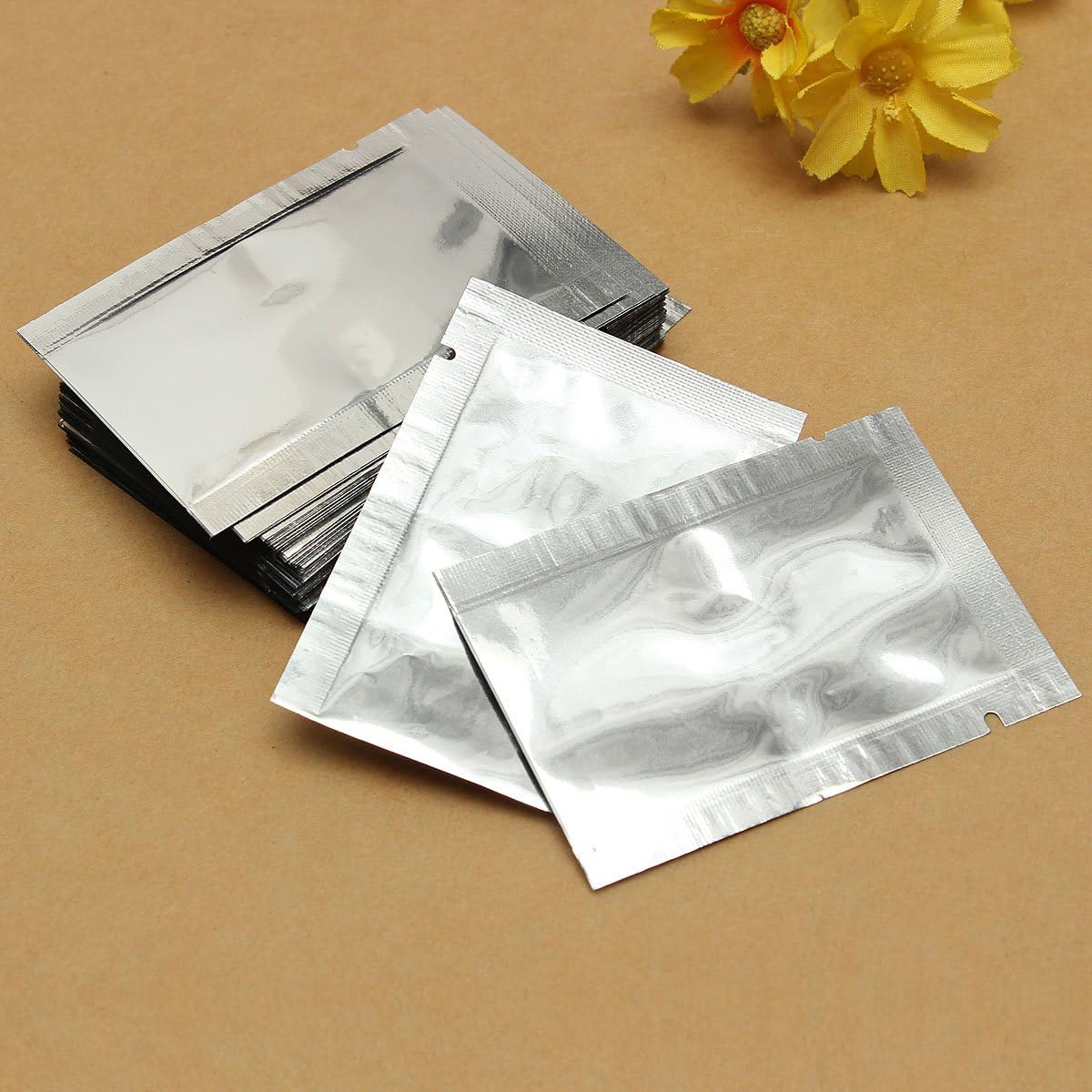 Lexpon 100 x Aluminium Foil Mylar Food Bags Vacuum Seal Silver Kitchen Food Bags, Silver Colours, 7 x 10 cm - Image 4