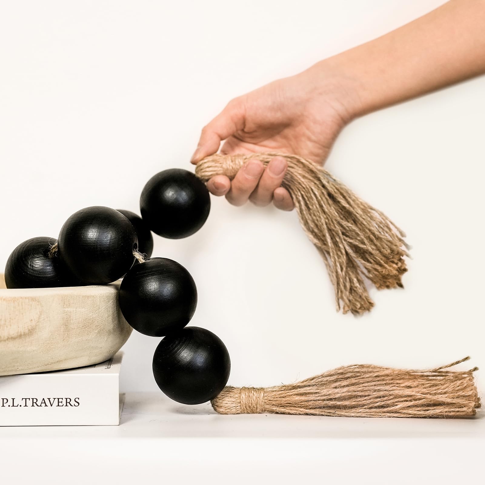 Photo 1 of RUIRUICO Extra Large Wood Bead Garland with 2" Diameter Wooden Beads, Wooden Beads Garland with Tassels, Decorative Beads for Farmhouse Decor (Black, 27 Inches)