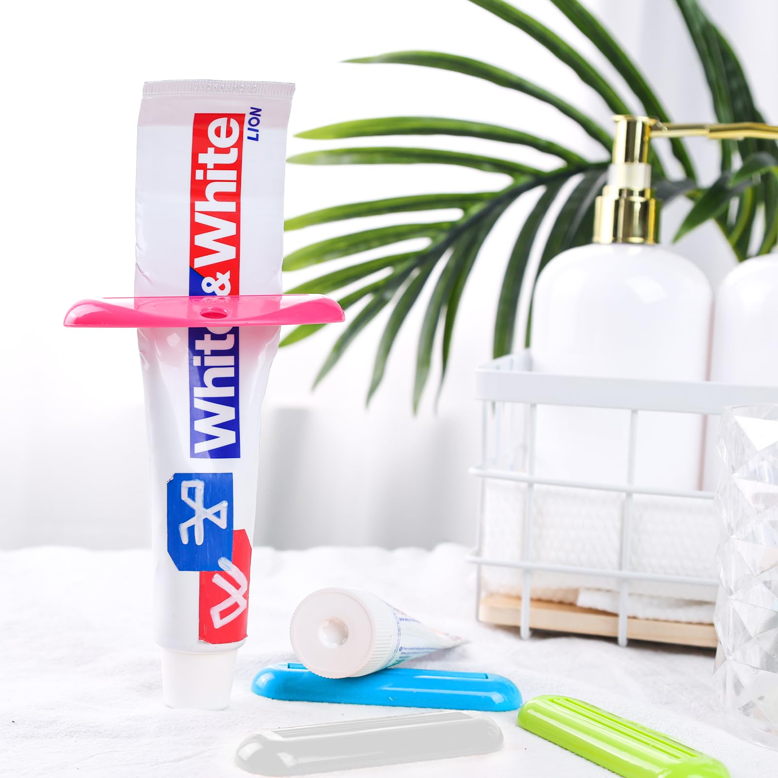 LOVEINUSA 4PCS Toothpaste Squeezer Dispensers, Multicolor Plastic Toothpaste Tube Squeezer Hanging Toothpaste Clips for Saving Toothpaste Facial Cleanser Creams Paint