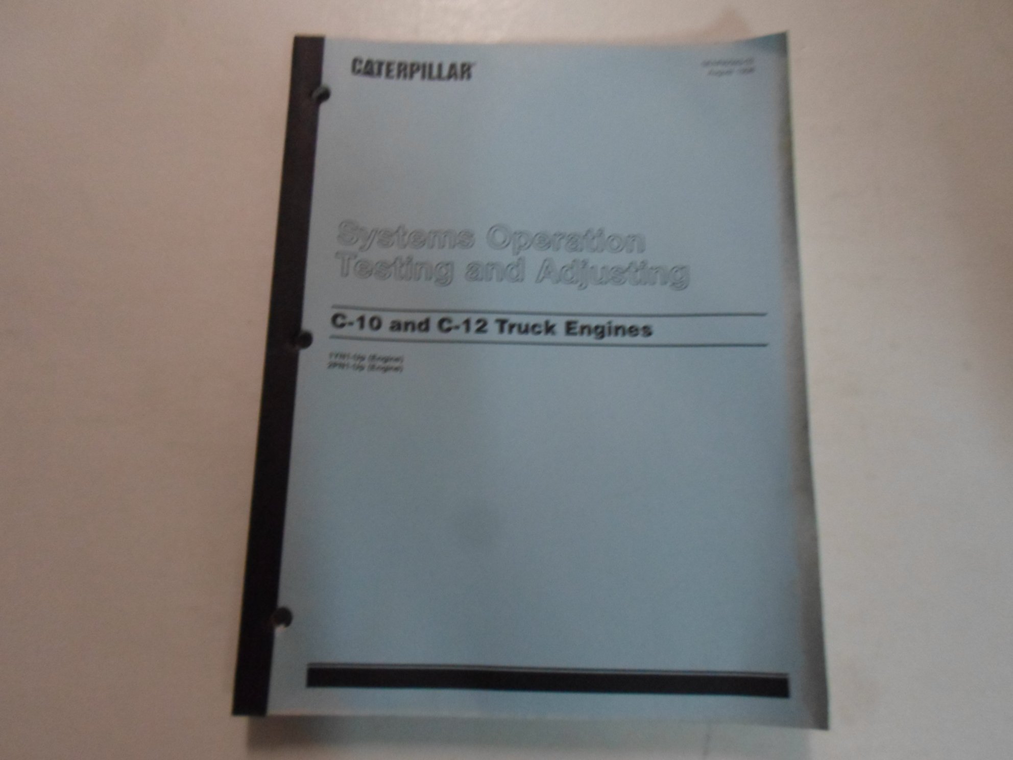 1998 Caterpillar C10 C12 Truck Engine System Ops Testing Manual WATER  DAMAGED*** Paperback – 1998