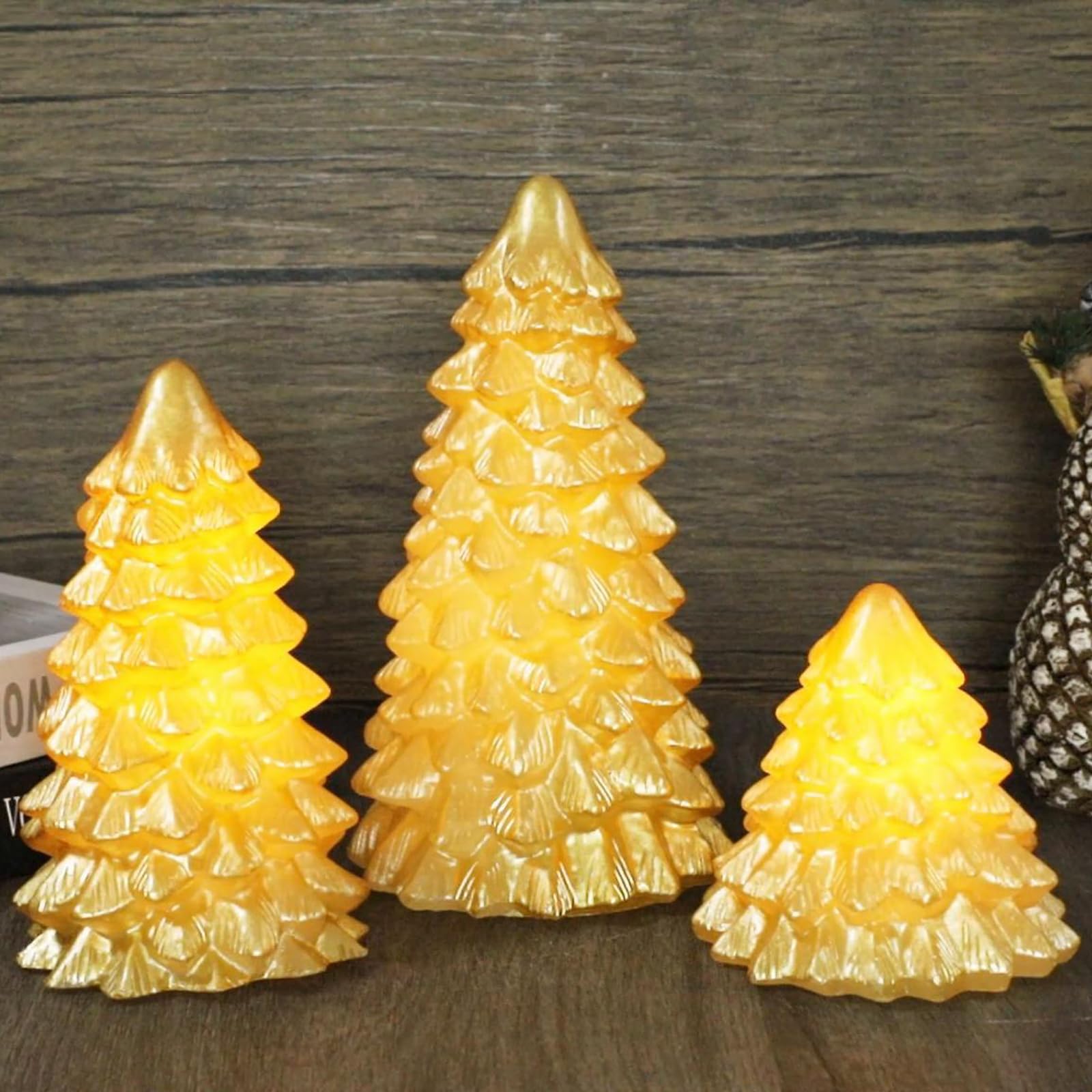 Photo 1 of ***DAMAGED - SEE NOTES/PICTURES*** FLAVCHARM Gold Christmas Tree Flameless Candles with Remote Battery Operated Flickering LED Tabletop Lighted Xmas Tree Figurines for Fireplace Home Decor Indoor Holiday Christmas Gifts