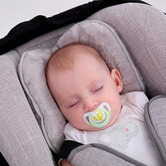 baby sleeping in car seat stroller
