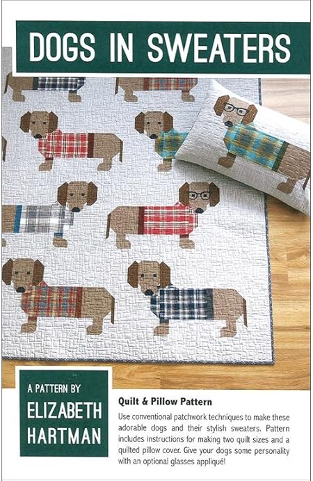 two dogs in sweaters