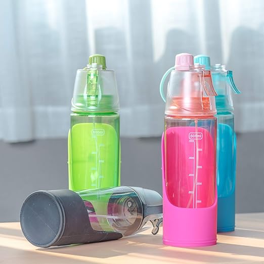 spray dog with water bottle