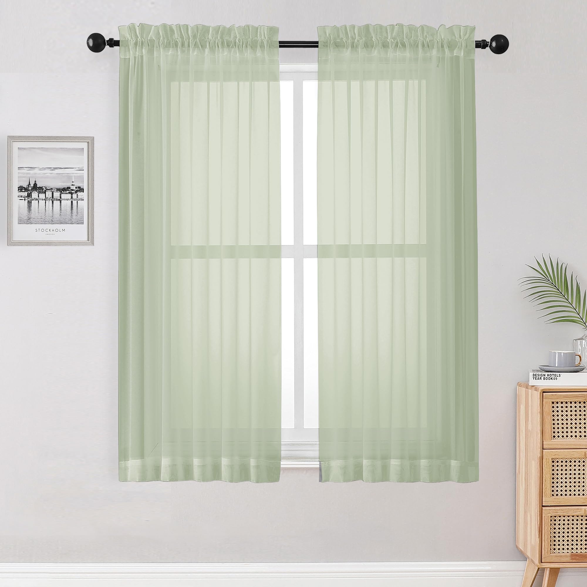 Photo 1 of OWENIE Sheer Curtains 63 inch Length 2 Panels Set, Rod Pocket Voile Fimly Sheer Drapes for Living Room/Bedroom, 2pcs, Each 42" W x 63" L, Light Green