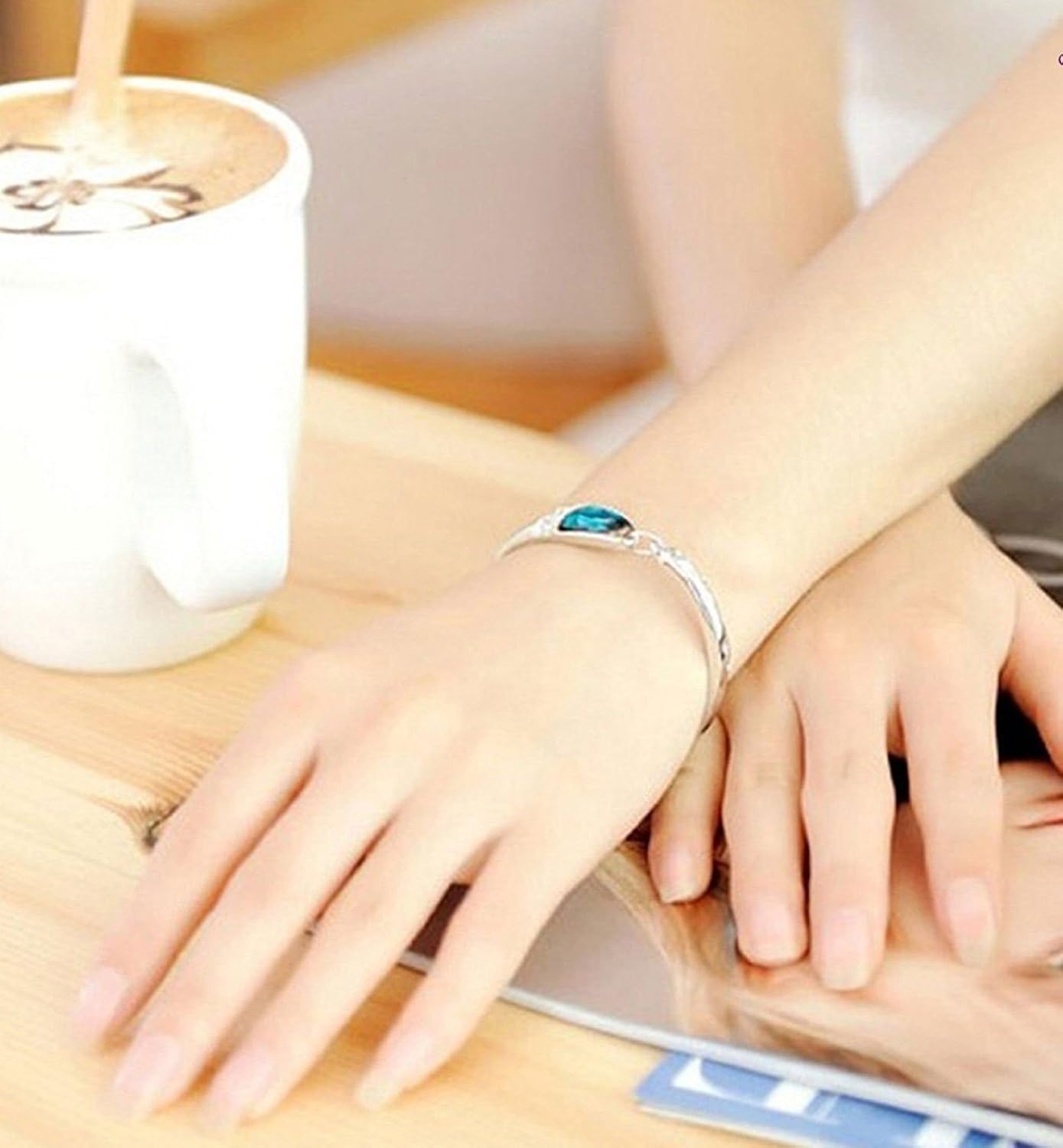 karatcart platinum plated blue crystal kadaa bracelet for girls