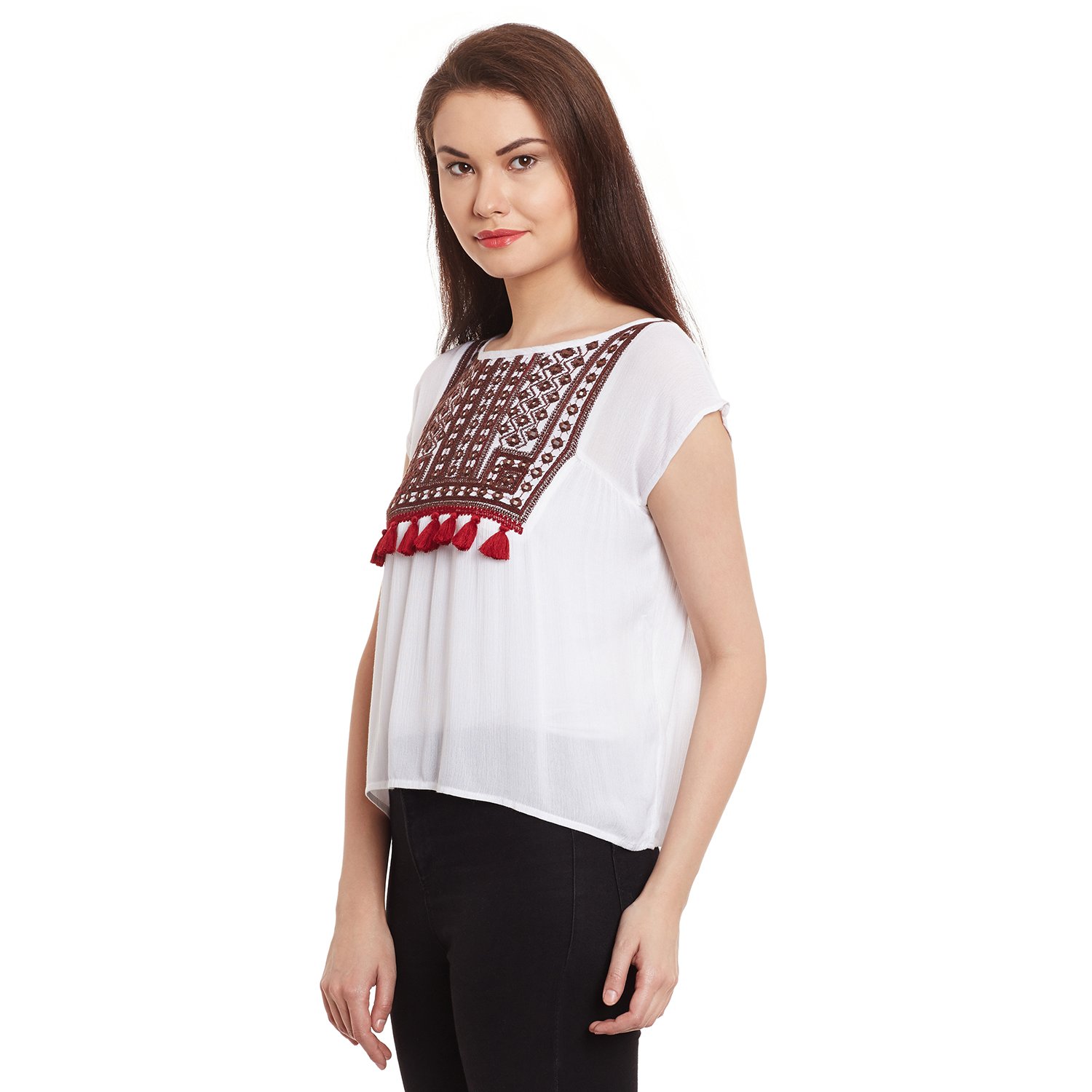 free & young white coloured top