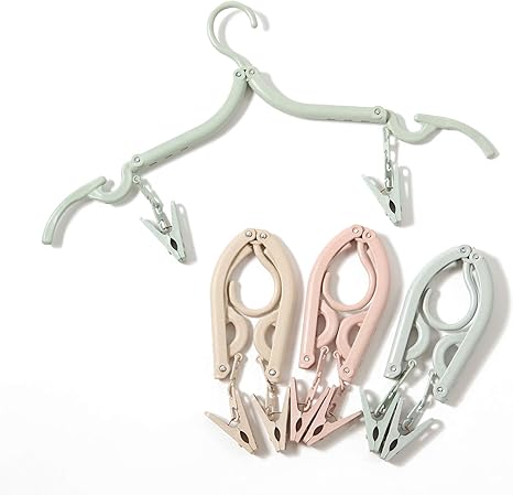 Amazon Co Jp ロジック 携帯ハンガー 旅行用ハンガー 4個セット ピンチ付き 折りたたみハンガー 専用ポーチ付き 旅行 トラベル 出張 物干し 洗濯用ハンガー 携帯用 ホーム キッチン