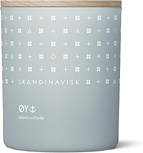 Skandinavisk ØY 'Island' Scented Candle. Fragrance Notes: Crabapple and Dog Rose, Water Mosses and Green Leaves. 7.0 oz.