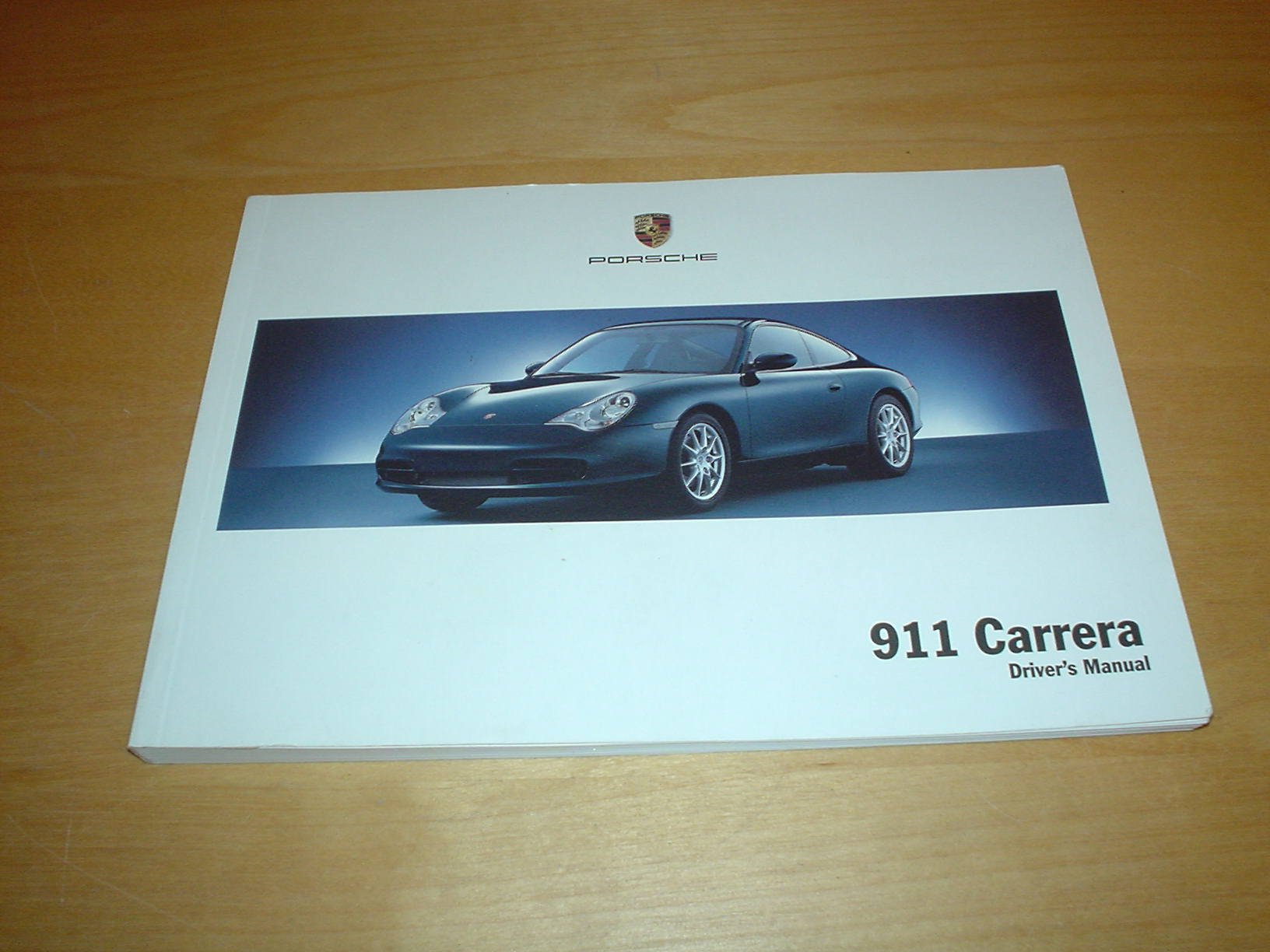 PORSCHE 911 CARRERA 4 & 4S OWNERS MANUAL HANDBOOK - TARGA COUPE & CABRIOLET  996 - OWNER'S HAND BOOK MANUAL Paperback – 2003