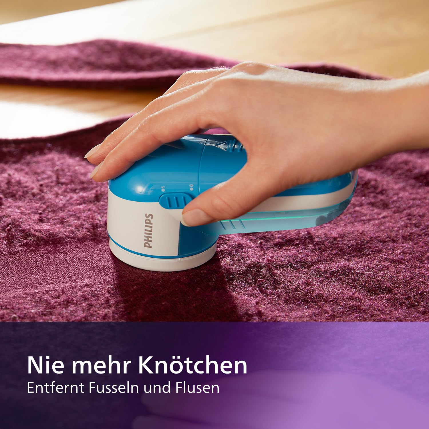 Philips Fusselrasierer – Fusselentferner für Kleidungsstücke, geeignet für alle Textilien, 2 Höheneinstellungen, batteriebetrieben (2X AA-Batterien inkl.), blau (GC026/00) 4