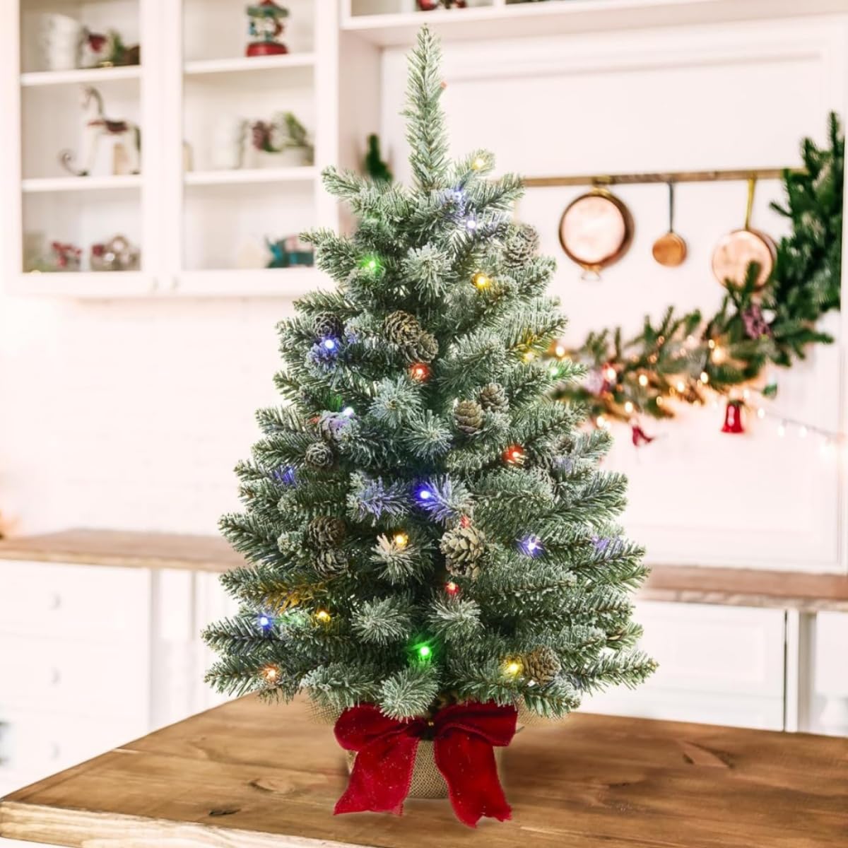Photo 1 of 2 ft Mini Christmas Trees with Red Bow Base, 25 F5 LED Lights, 24" Decorated Burlap Artificial Tabletop Christmas Trees with Flocked Pine Cone
