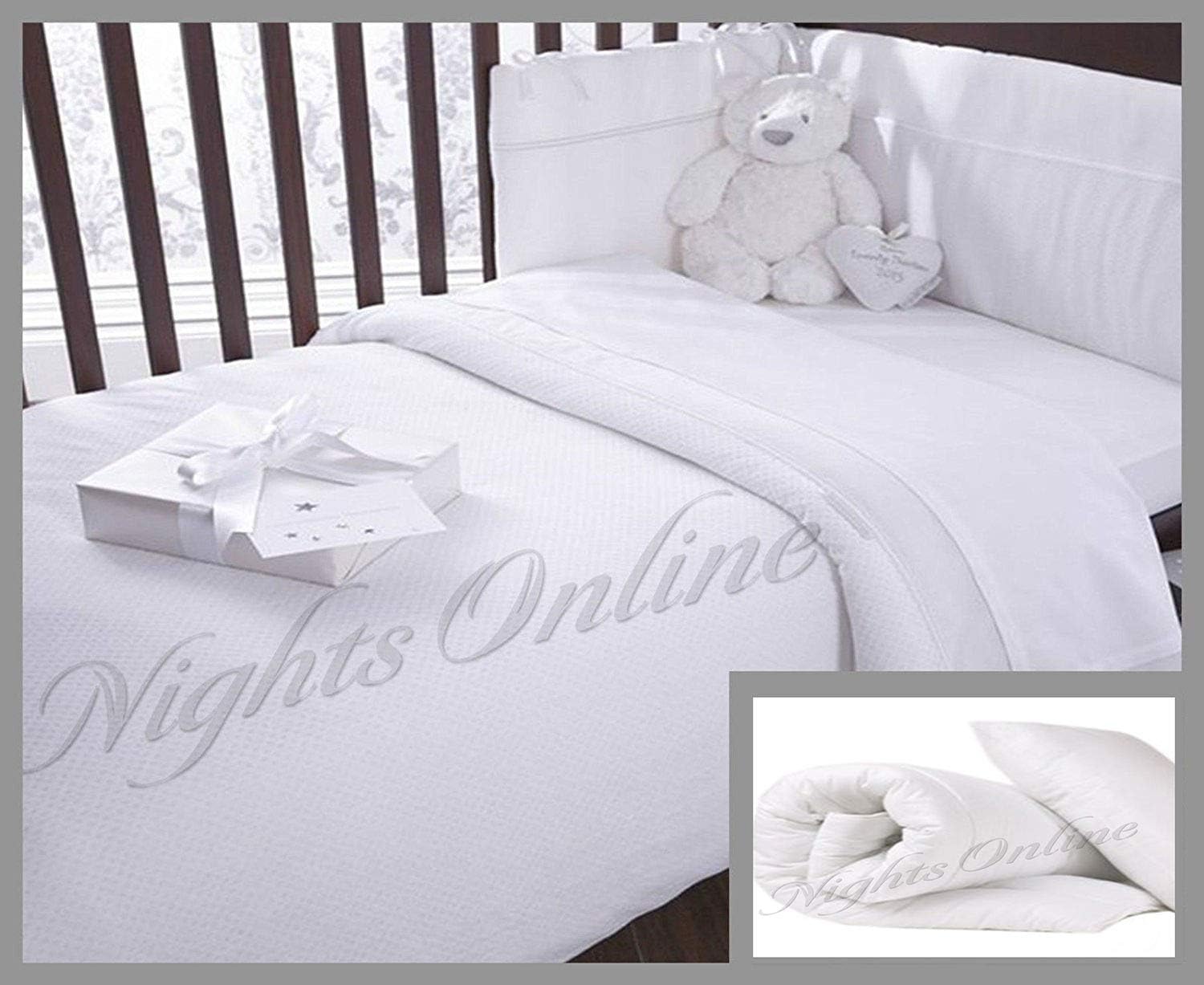 cot bed quilt and pillow