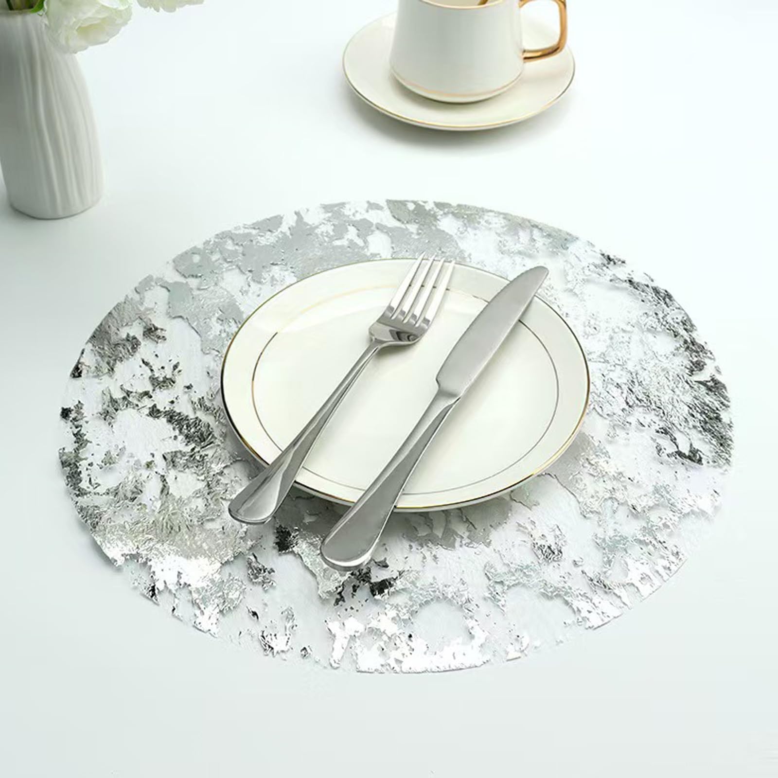 Photo 1 of YLUSUJAKX Disposable Silver Placemats Set of 50 Silver Doilies Charger Round Metallic Glitter Foil Pressed Dining Table Decoration Centerpieces for Party Wedding Birthday