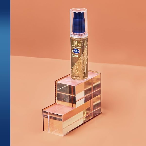 VASELINE ILLUMINATE ME SHIMMERING BODY OIL CREATED FOR MELANIN RICH SKIN, ILLUMINATES SKIN WITH FINISHING TOUCH OF SHIMMER FOR GLOWING SKIN 3.3 OZ