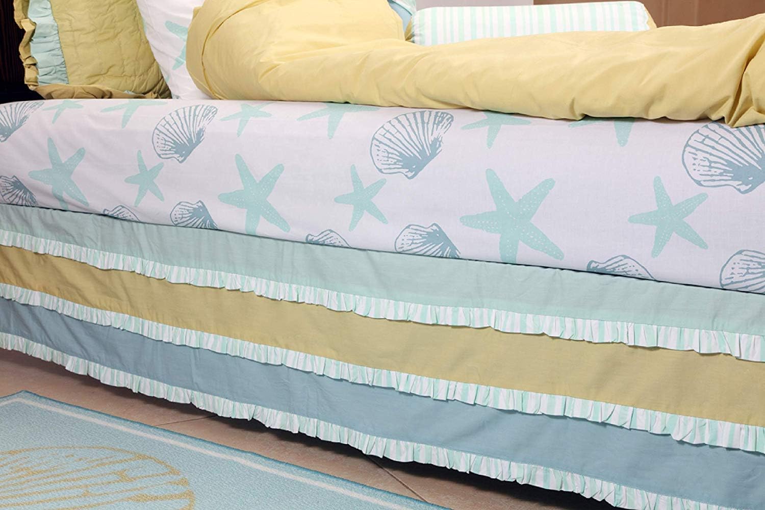 Pink Guppy Bed Skirt/Dust Ruffle for Twin Bed. 11" Drop with Split Corners. Accommodates Posts, hides Under Bed Storage. 3 Ocean Color Bands with Striped Ruffles. Size 39" x 75"