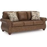 Signature Design by Ashley Faux Leather Sofa, Earth Brown, Chatterton | Nailhead trim accents and decorative turned legs, Sag-resistant platform foundation system, Fits 32 in minimum doorways