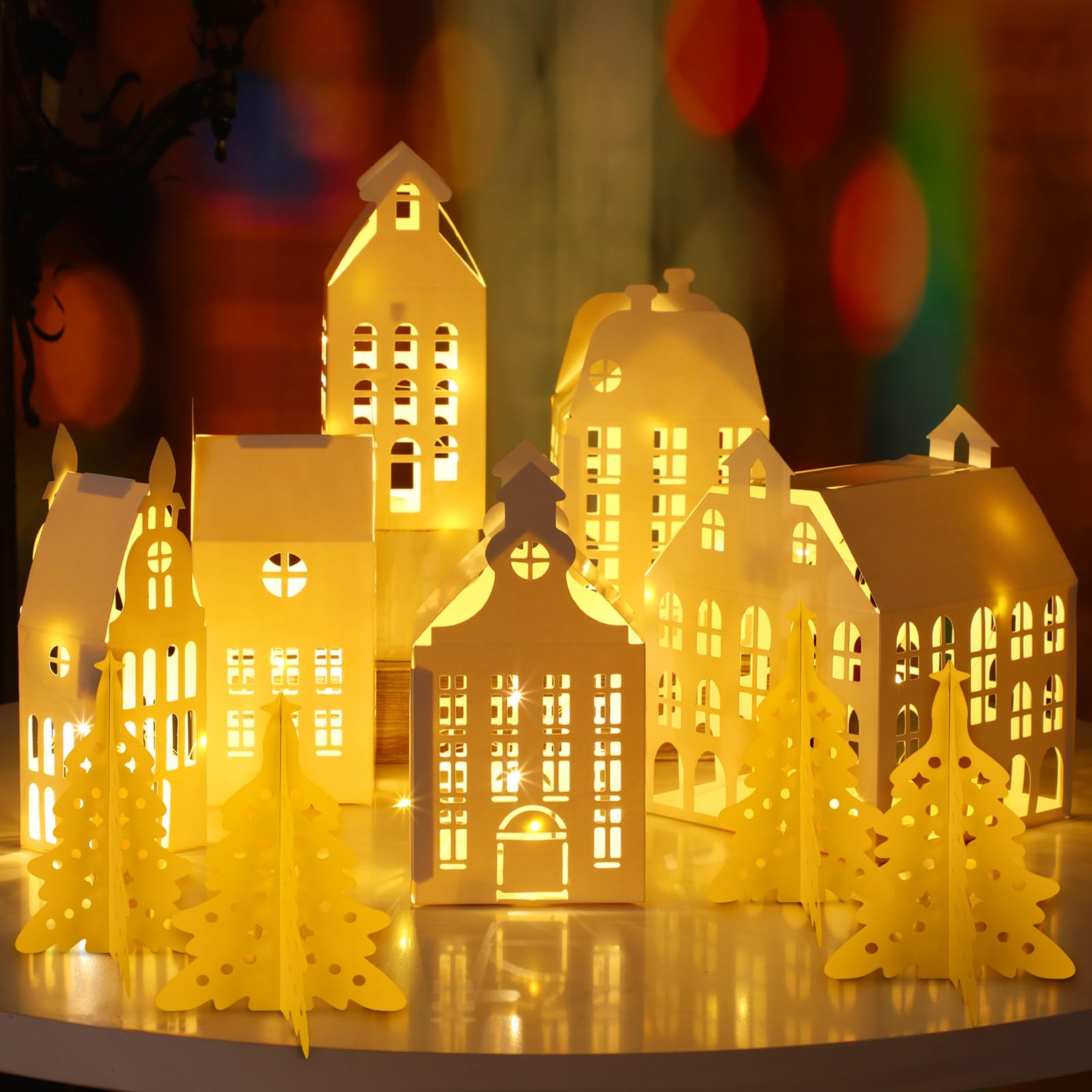 Photo 1 of 10 Pcs 3D Christmas Village Houses Sets White Winter Village with Light Xmas Houses and Trees Lantern Paper Decoration Christmas Figurines Scene Desktop Ornament for Home Xmas Village Party Decor