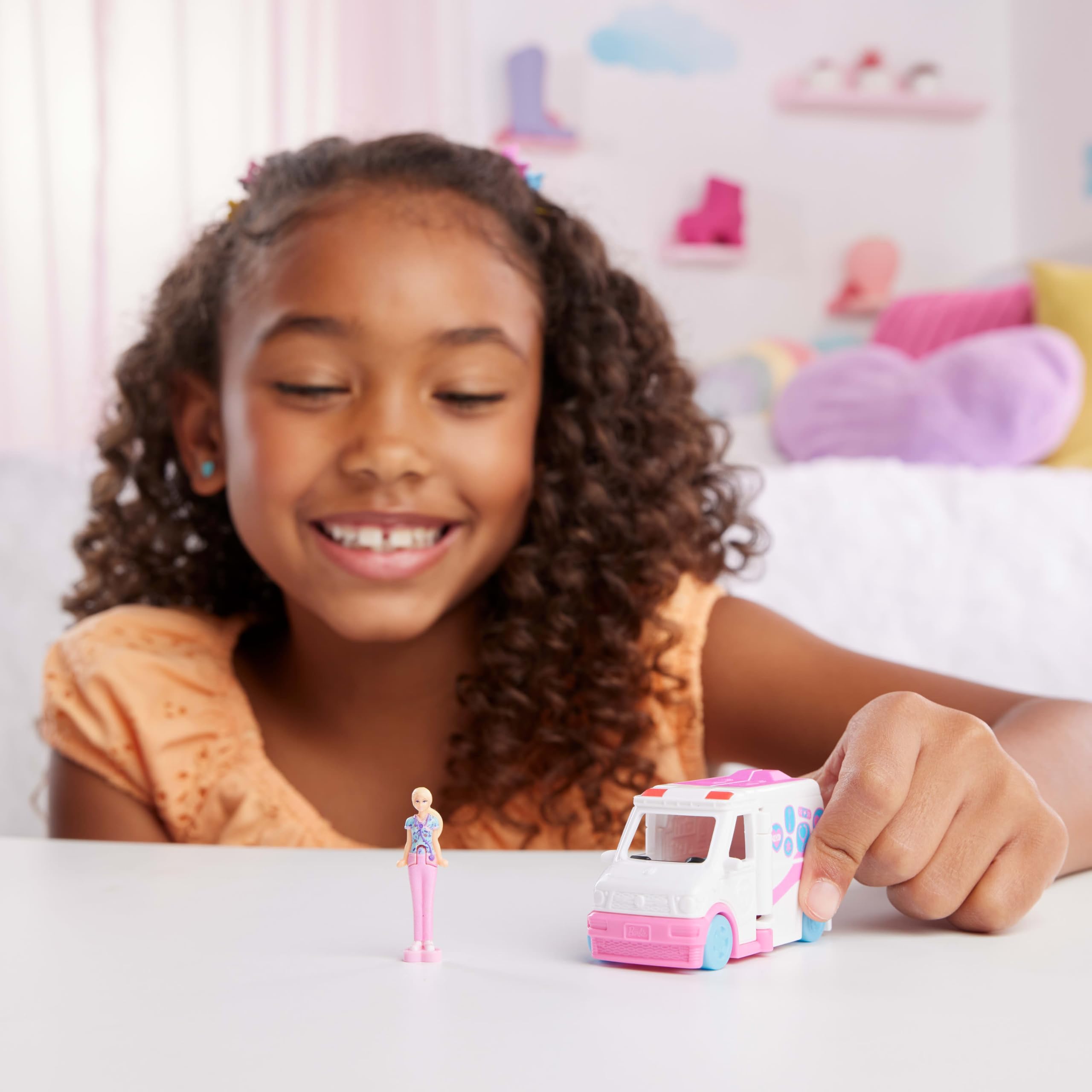 Barbie Mini BarbieLand Doll & Toy Vehicle Set with 1.5-inch Doll, Color-Change Care Clinic Vehicle & Medical Office