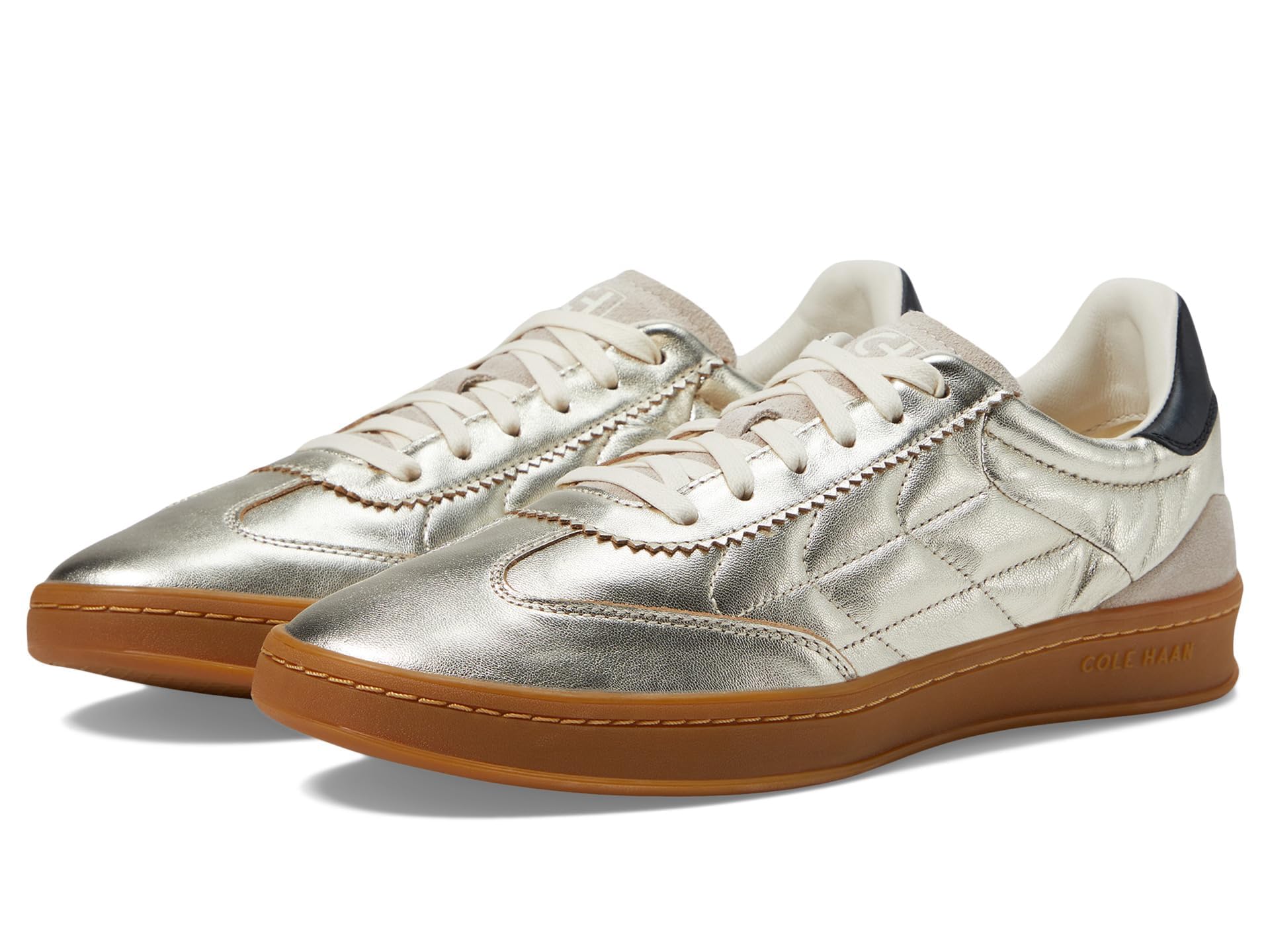 Photo 1 of Cole Haan Women's Grandpro Breakaway Sneaker, Gold/BRCH/BLK, 8.5