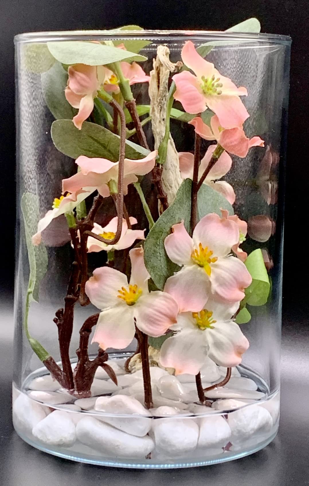 SMArtDecor Ltd - Artificial Eucalyptus with Pink Dogwood Flowers.12x12x18cm Vase, Set in Faux Water with Pebbles and Natural Driftwood