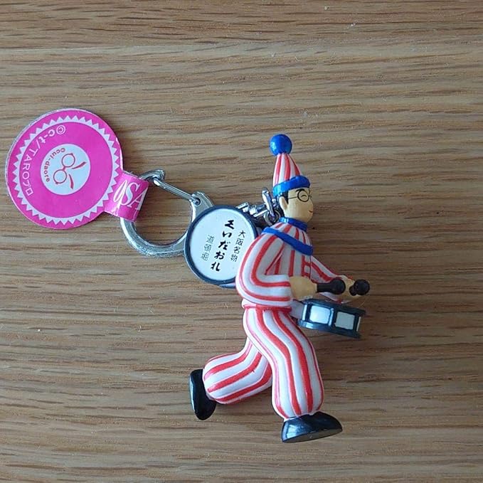 Amazon 大阪道頓堀 くいだおれ太郎 キーホルダー アニメ 萌えグッズ 通販