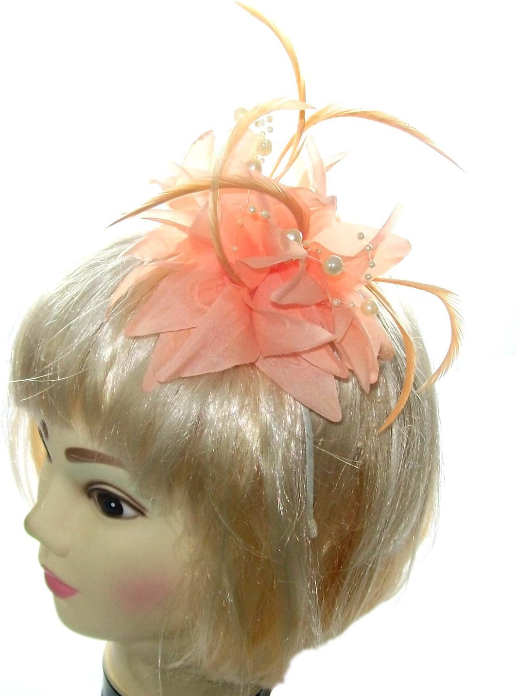 Hair fascinator in soft peach with hanging pearls for special occasions, weddings, races, ladies