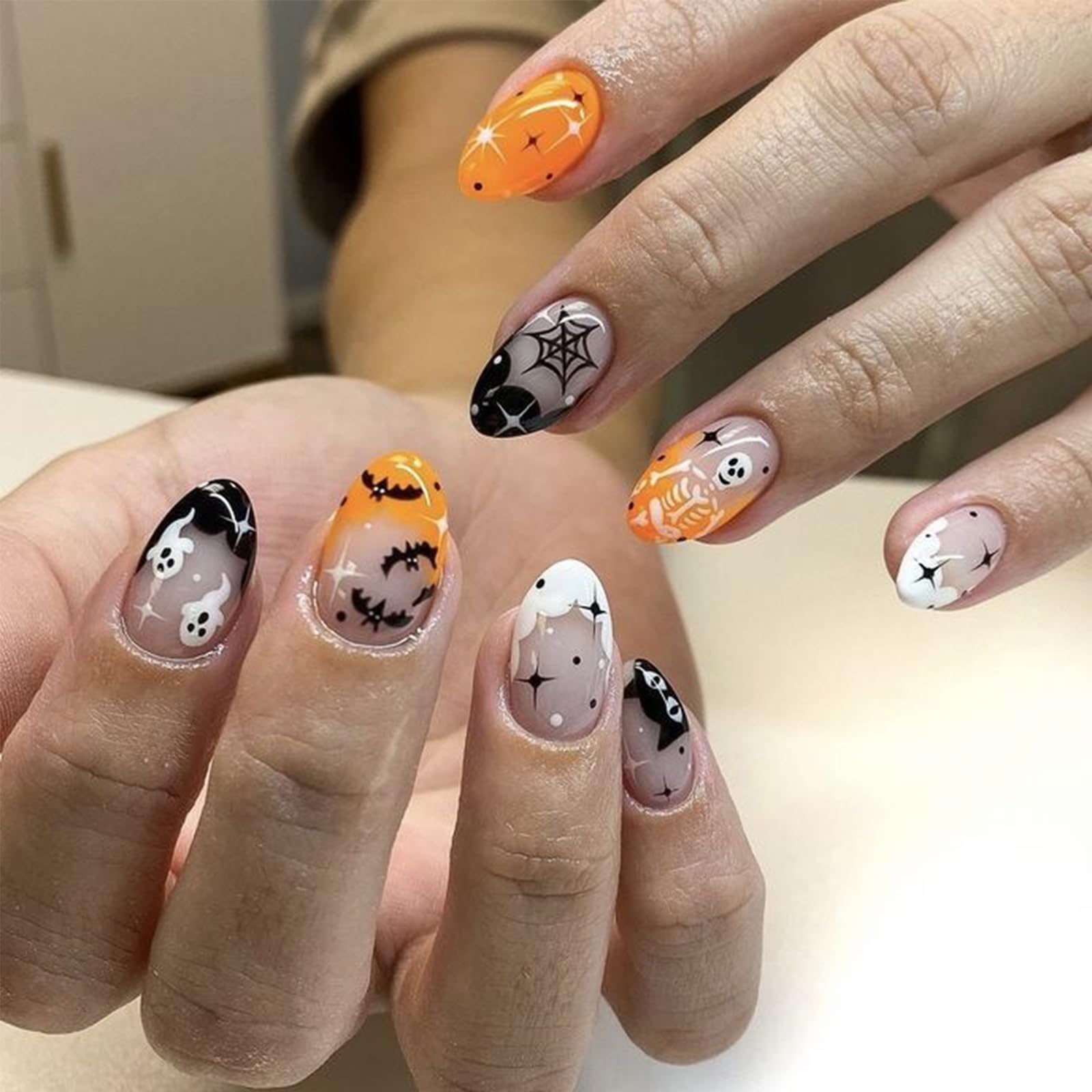 Photo 1 of Halloween Bat Ghost Press on Nails Short Almond Fake Nails with Black Cat Star Designs Full Cover Glue on Nails Black White French Tip Acrylic Nails Cute Holiday False Nails for Women DIY Decor 24Pcs