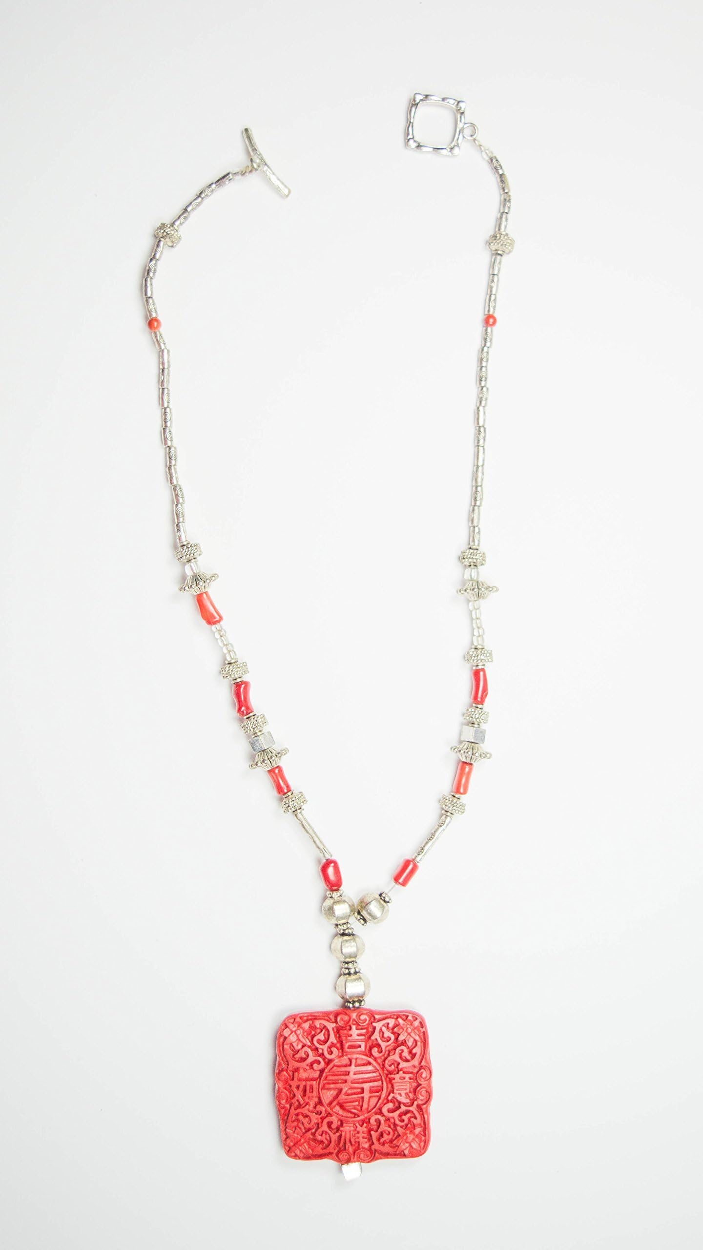 Red Coral beaded necklace and Silver crafted beads with a exotic Red Coral Chinese Motif for good fortune Pendant.