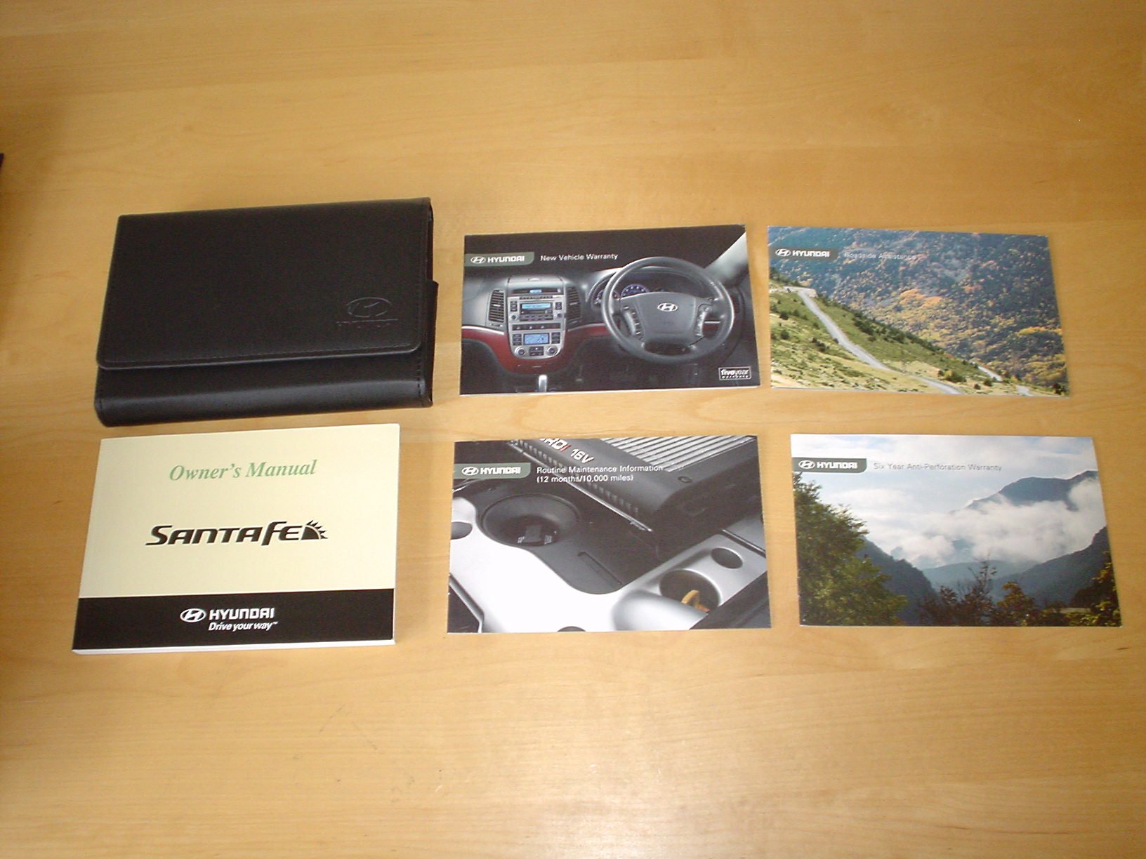 HYUNDAI SANTA FE OWNERS HANDBOOK (2007 - 2009) - 2.7 LITRE PETROL 2.2 L CRDi  DIESEL - OWNER'S HAND BOOK MANUAL Paperback – 2007
