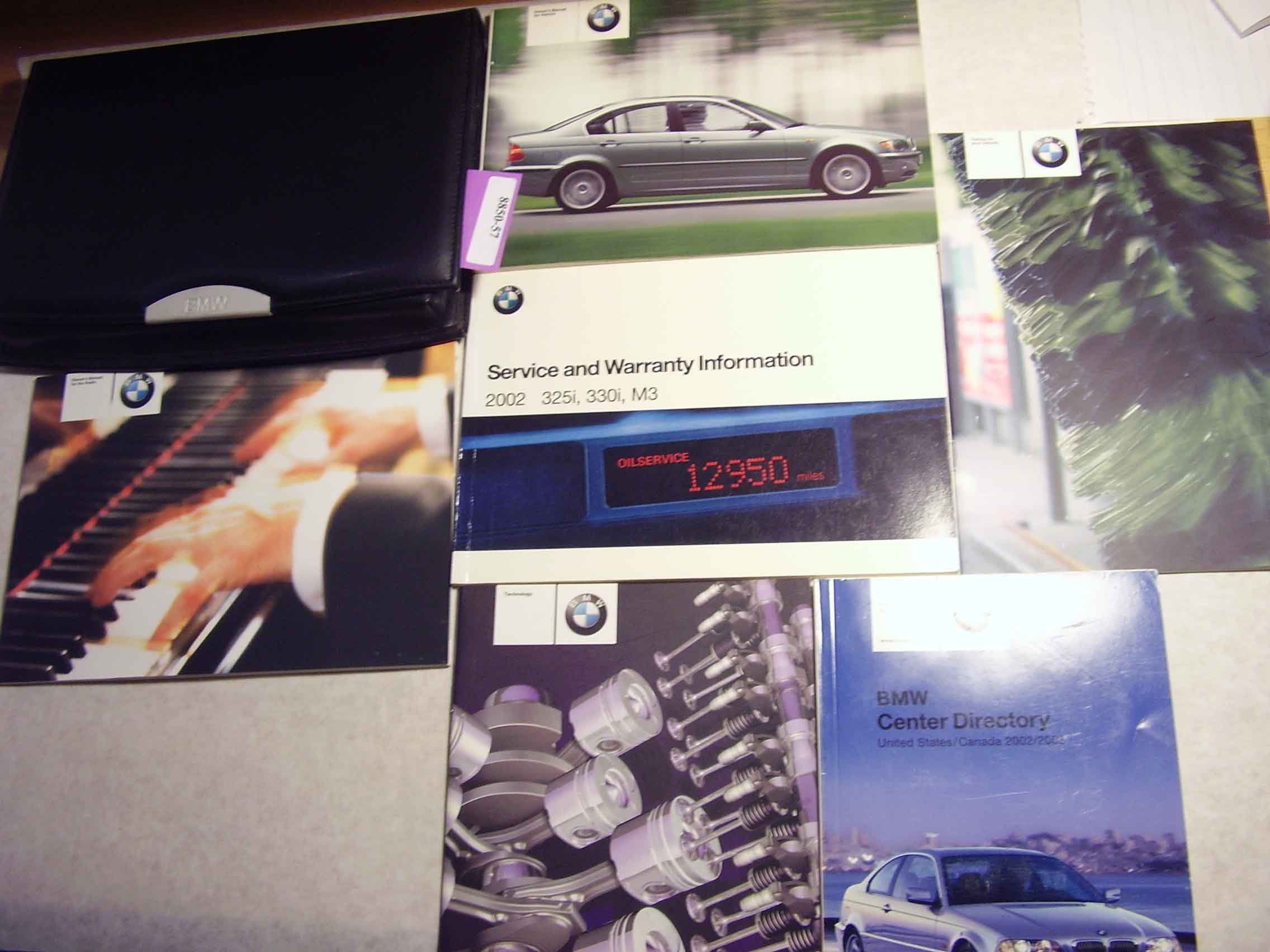 2002 BMW 320i 325i 330i Owners Manual Paperback – 2002