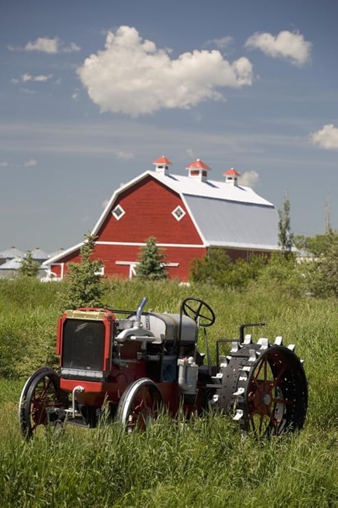 Amazon Com Posterazzi Old Tractor In A Field With A Red Barn In