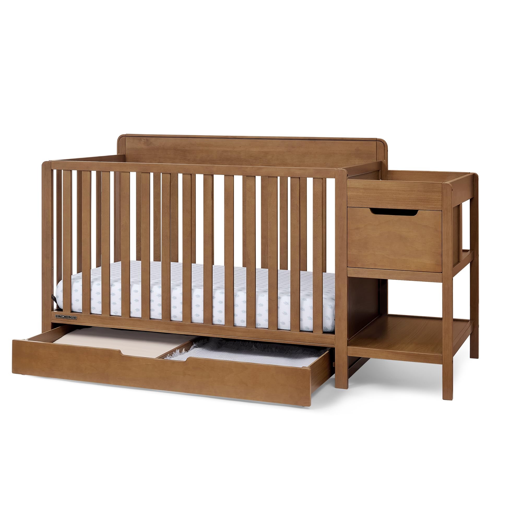 Photo 1 of Delta Children Maya 5-in-1 Convertible Crib and Changer with Storage, Converts to Toddler Bed, Daybed, Sofa & Full Bed, Fits Standard Crib Mattress, 3 Mattress Heights for Baby Nursery, Chestnut